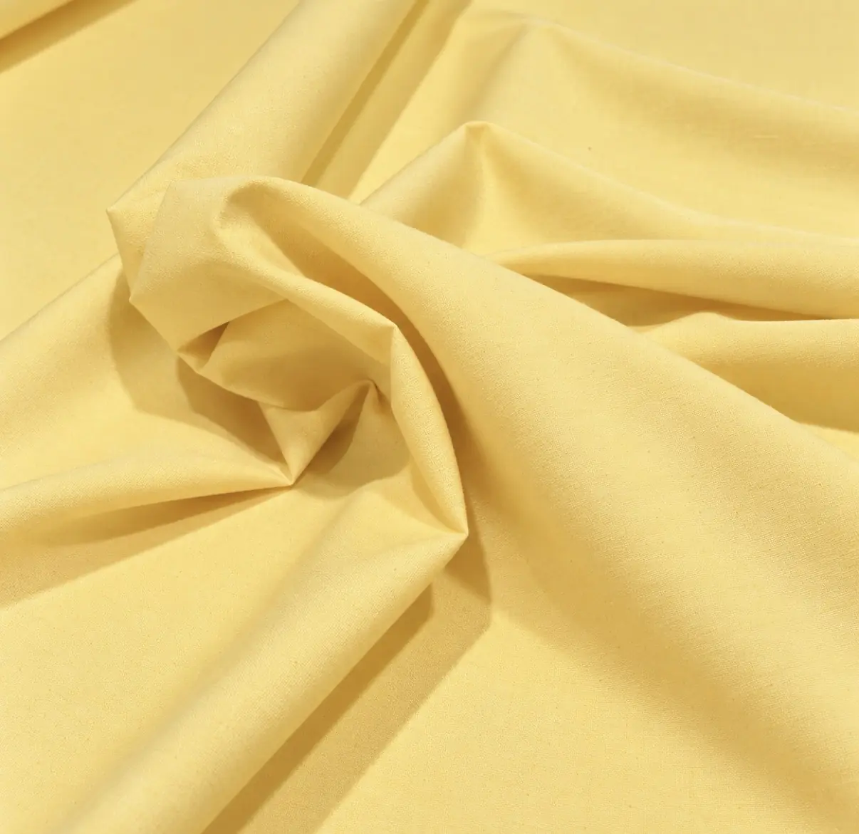Popelín amarillo pastel
